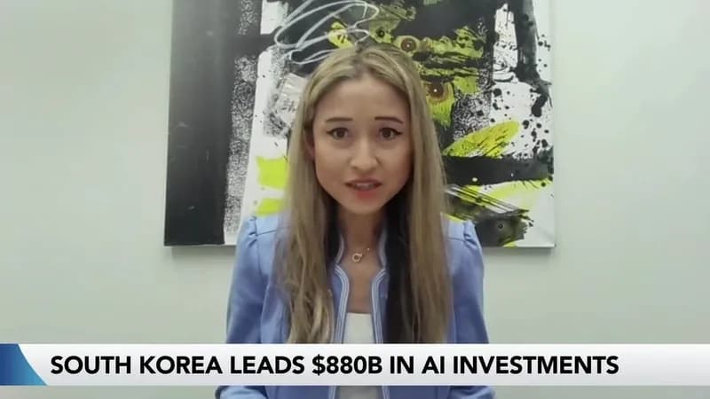 Momei Qu subliniază perspective divergente privind costurile și cererea în investițiile în AI